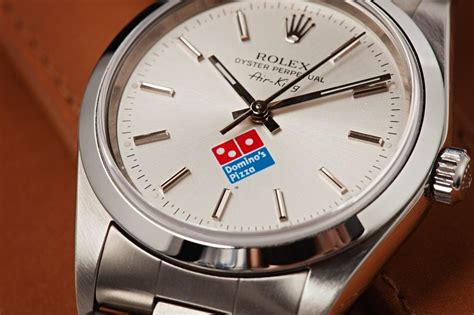 domino's rolex|domino's rolex value.